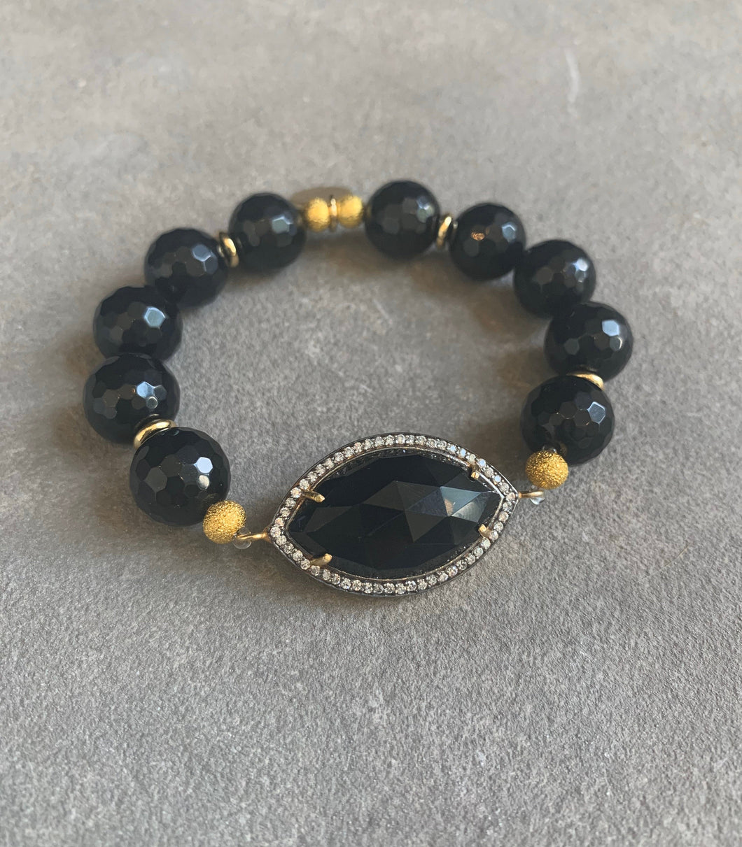 Black onyx, crystals & gold beaded bracelet