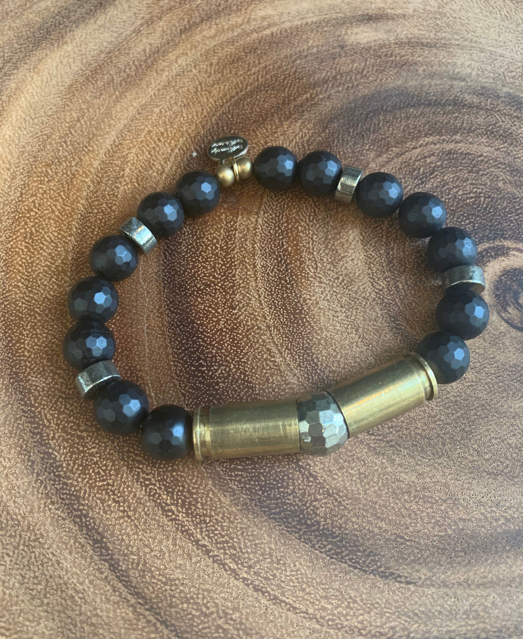 Gun casing and black agate beaded bracelet