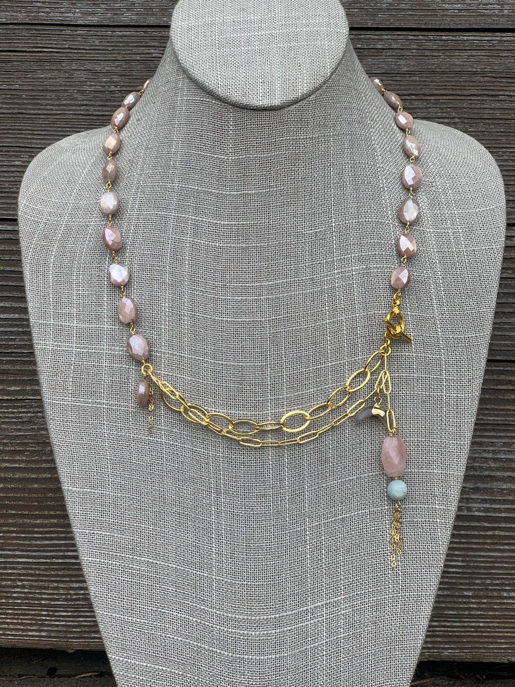 Peachy moonstone and gold filled charmed chain necklace